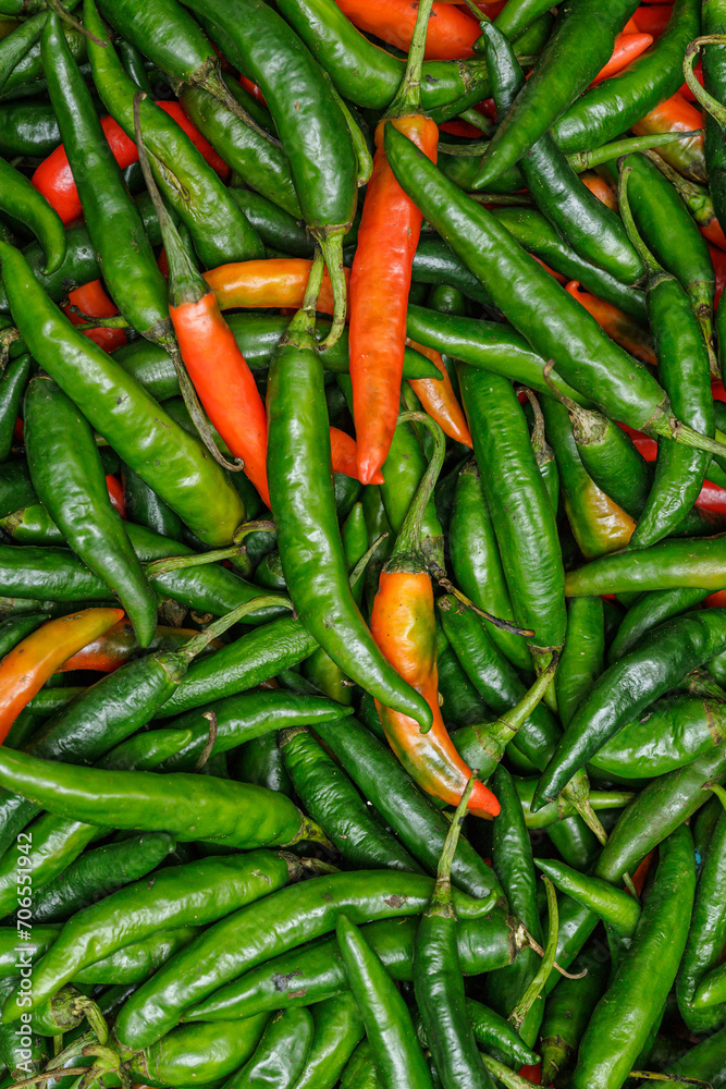 Harvest green and red chilies. Green and red chilies in traditional market. Green and red chilies fullframe. Harvest green and red chilies. Green and red chilies in traditional market. Green and red chilies fullframe.