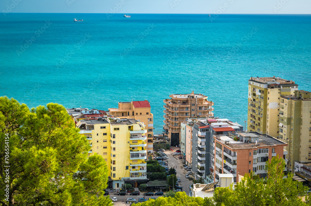 top view image of Durres buildings, the Albanian coastline city next to Adriatic sea. 