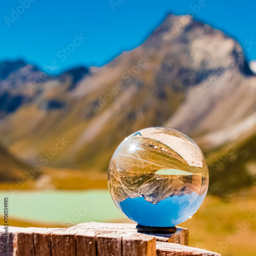 Crystal ball alpine summer landscape shot at Lake Rifflsee, Mandarfen, Imst, Tyrol, Austria