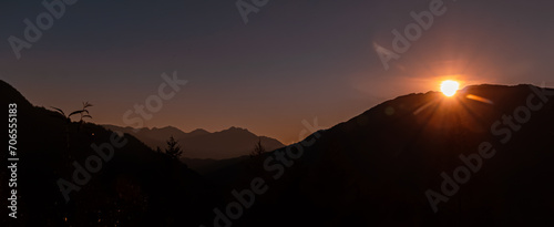 Alpine sunset or sundowner with a sunstar at Jerzens  Pitztal valley  Imst  Tyrol  Austria