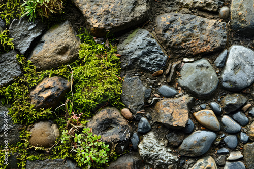 stone texture with moss and pebbles