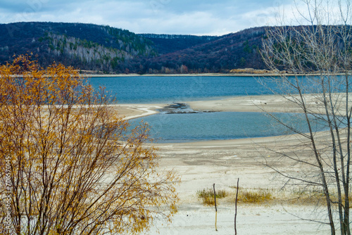 The sandy bank of the Volga River in the Zhiguli Mountains on an autumn day