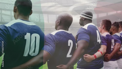 Animation of flag of france over diverse male rugby players singing anthem at stadium photo