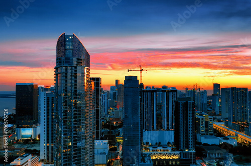 Aerial View of Miami City at Sunset From Building Top. Captivating sunset view of Miami cityscape, captured from the top of a building.