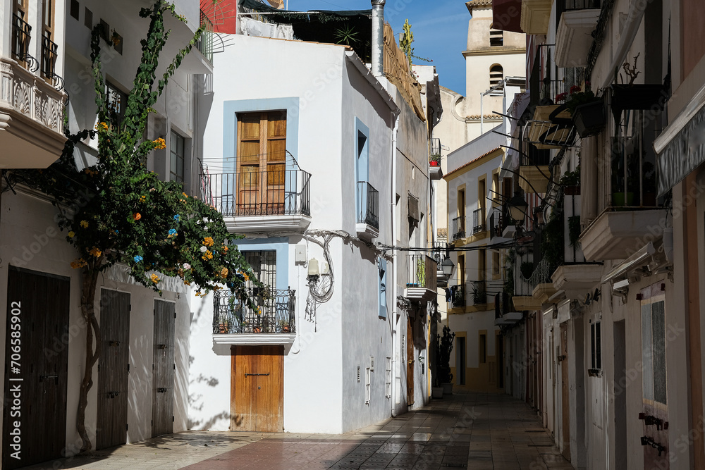 Romantic backstreet, side street and alleys in historic old town of Ibiza Stadt, Balearic Island with historic Mediterranean style architecture facades, a landmark sightseeing tourist spot in downtown