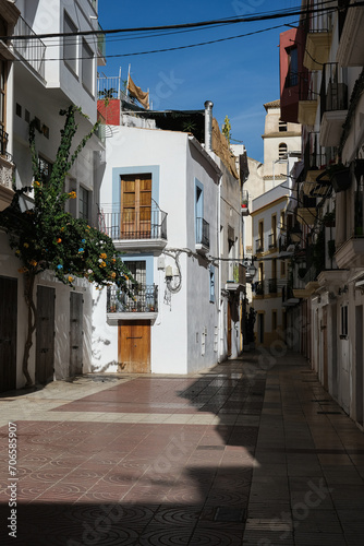 Romantic backstreet, side street and alleys in historic old town of Ibiza Stadt, Balearic Island with historic Mediterranean style architecture facades, a landmark sightseeing tourist spot in downtown