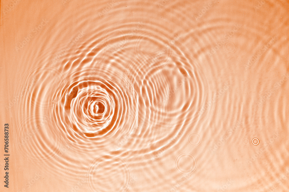 Pattern of circles on clear water from drops Transparent surface texture of clear blue water with ripples, splashes and bubbles Cosmetic moisturizer micellar toner emulsion Pattern of circles on clear water from drops Transparent surface texture of clear blue water with ripples, splashes and bubbles Cosmetic moisturizer micellar toner emulsion