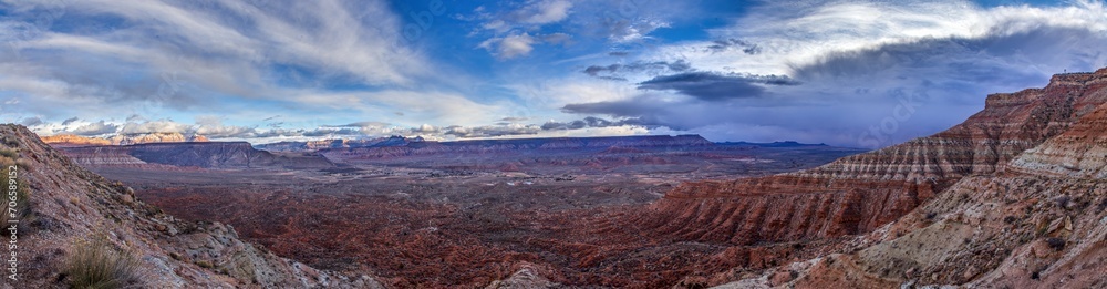 High-contrast panoramic image of the canyon landscape of the Arizona desert