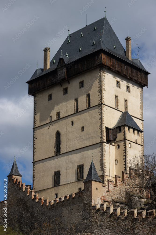 Historical wall and tower of the historical Karlstejn castle.	