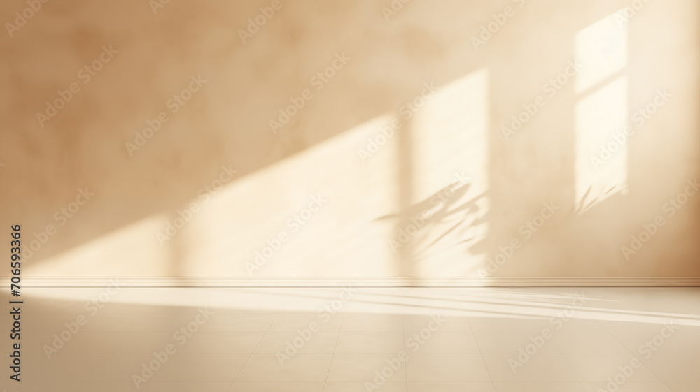 Warm sunlight casting geometric shadows on a beige wall. Soothing shadows of window panes on a textured beige backdrop