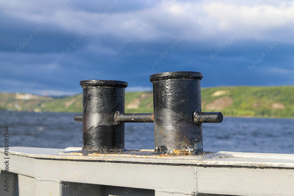 Old rusty double bitt bollard on a river boat Old rusty double bitt bollard on a river boat