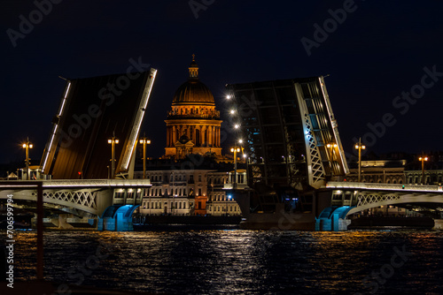 view of the night city and drawbridge