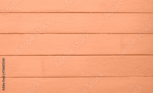 Texture of Peach fuzz wooden boards. Grunge texture old wood. Peach fuzz color wood texture background surface with old natural pattern. Wood texture background, wood planks. Color trendy 2024.