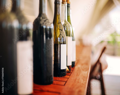 Wine bottles on wooden table