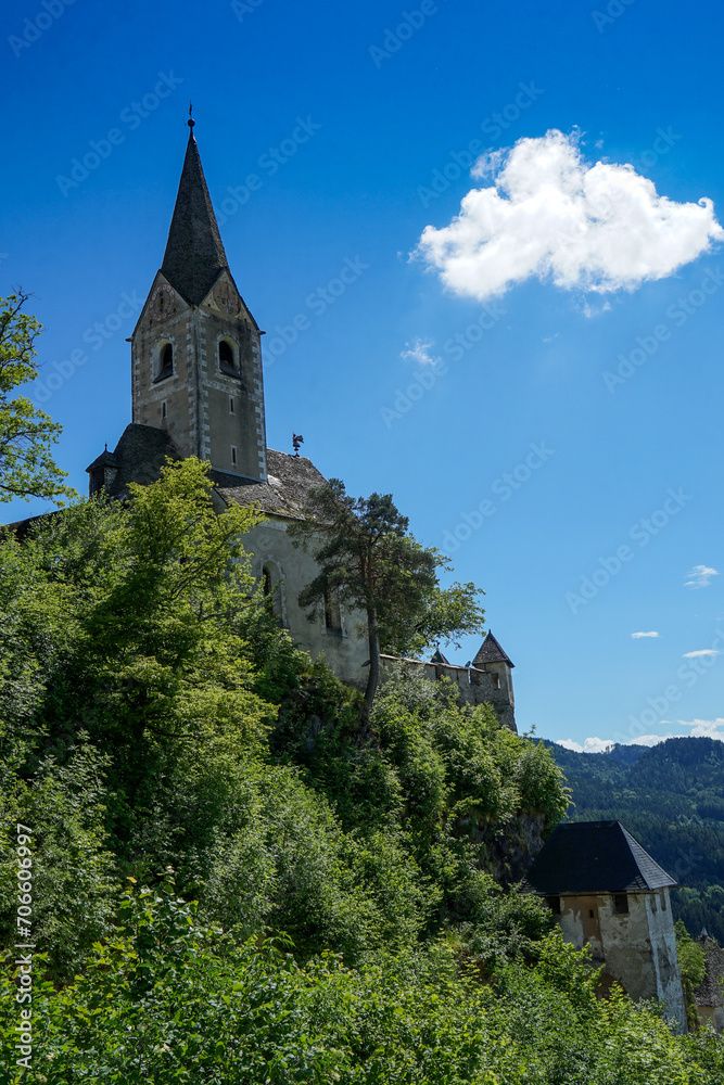 Idyllic scenery: church on hill at iconic castle hochosterwitz in Carinthia, Austria