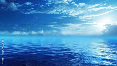 Vast Body of Water Beneath Cloudy Blue Sky With Calm Scenery