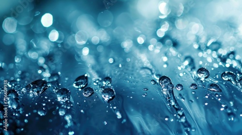 Sparkling Blue Surface With Glistening Droplets of Water
