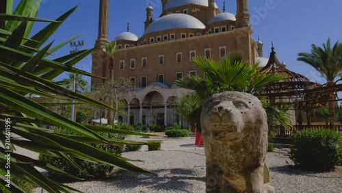 Great Mosque of Muhammad Ali Pasha or Alabaster Mosque situated on the summit of the citadel. Lion figure with green palm leaves.Touristic attraction. Cairo. Egypt. 