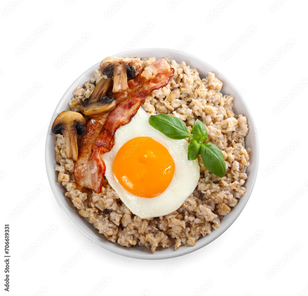 Tasty boiled oatmeal with fried egg, mushrooms and bacon isolated on white, top view Tasty boiled oatmeal with fried egg, mushrooms and bacon isolated on white, top view