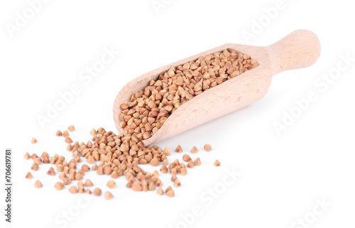 Scoop with dry buckwheat isolated on white