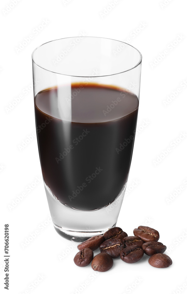 Shot glass with coffee liqueur and beans isolated on white Shot glass with coffee liqueur and beans isolated on white