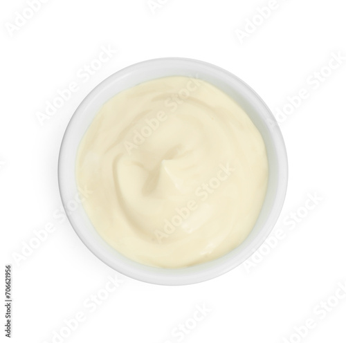 Fresh mayonnaise sauce in bowl isolated on white, top view