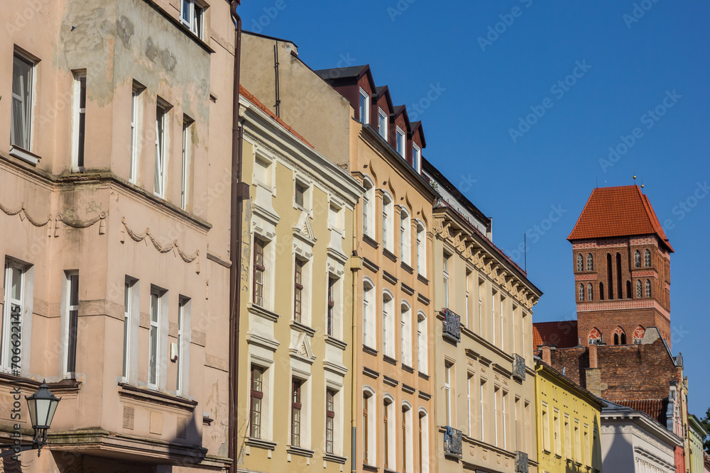 Colorful facades and tower of the St. James church in Torun, Poland