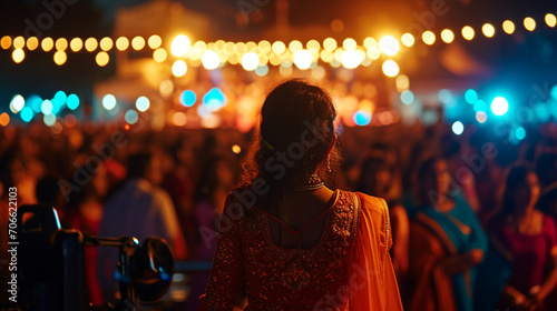 A crowd enjoying a live music performance during Navratri, Navratri, blurred background, with copy space