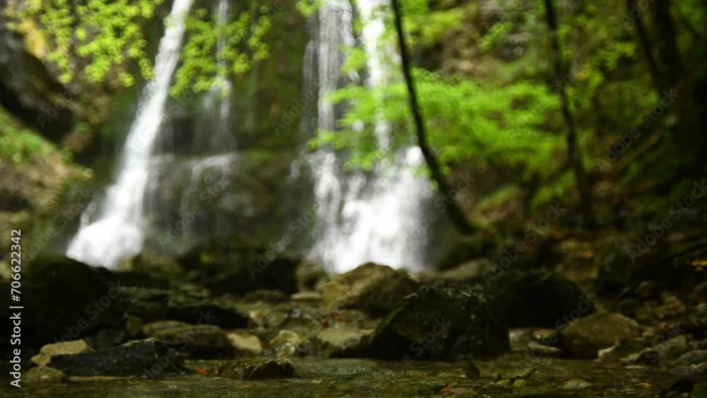 Rain in front of the main waterfall at Josephsthaler Wasserfälle in the summer evening in slow motion Rain in front of the main waterfall at Josephsthaler Wasserfälle in the summer evening in slow motion
