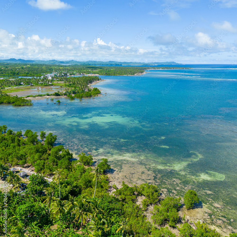 Philippines Aerial View. Tropical Island Turquoise Blue Sea Water. Siargao Island, Philippines, Southeast Asia.