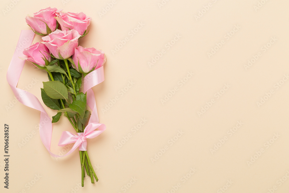 Pink roses on color background, top view. Valentines day concept Pink roses on color background, top view. Valentines day concept