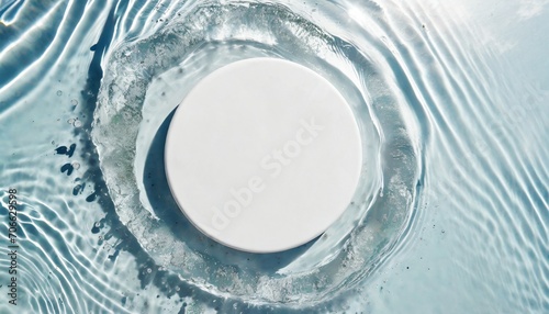 empty white circle podium on clear calm water texture with splashes and waves in sunlight abstract nature background for product presentation flat lay cosmetic mockup copy space