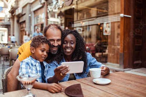 Multicultural Family Sharing a Smartphone at an Urban Cafe