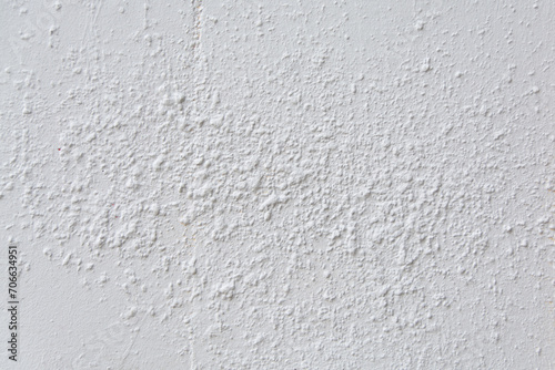 Old white concrete texture background vertical wall.