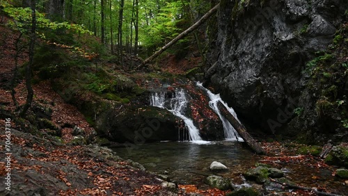 A waterfall in an autum forest, part of Josepsthaler Wasserfälle