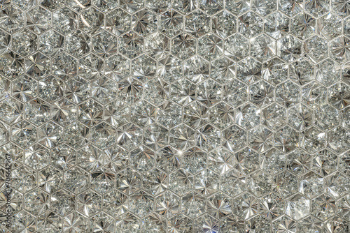 Brilliant diamond shape background.
Multifaceted wallpaper with sparkling lights.
