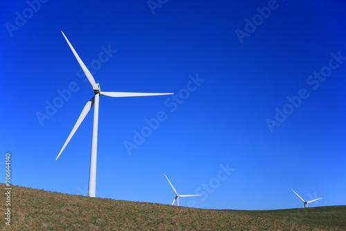 wind turbines in a landscape.