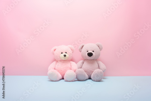 Two teddy bears on pink background with copy space for text. A couple of toy bears sitting together. Concept of love, Valentine's Day, Birthday, wedding. For banner, poster, card, postcard