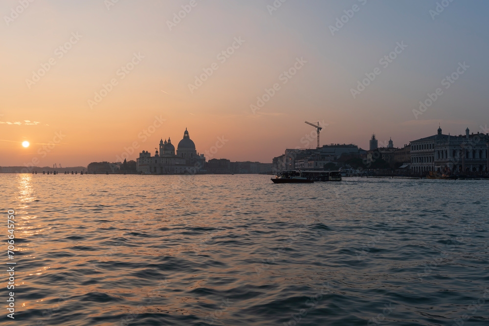 Venice Sunset Phase with boat life and water reflection