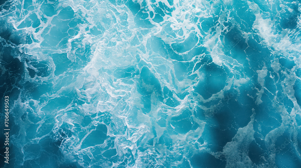 Obraz premium Turquoise ocean waves from above.