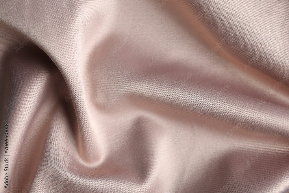 Texture of delicate pink fabric as background, closeup