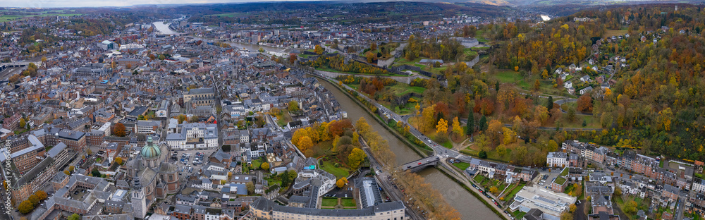 Aerial around the old town of Namur in Belgium on a cloudy afternoon in autumn.