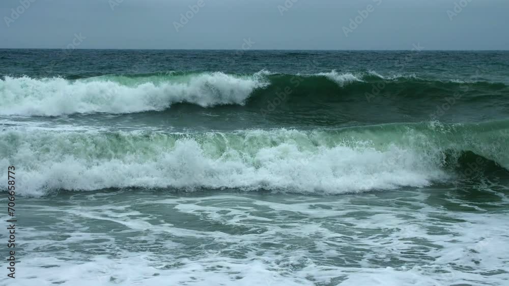 Slow motion. Turquoise waves with white foam in the surf line. Perfect surf. Sport. Adrenalin. Pleasure Slow motion. Turquoise waves with white foam in the surf line. Perfect surf. Sport. Adrenalin. Pleasure