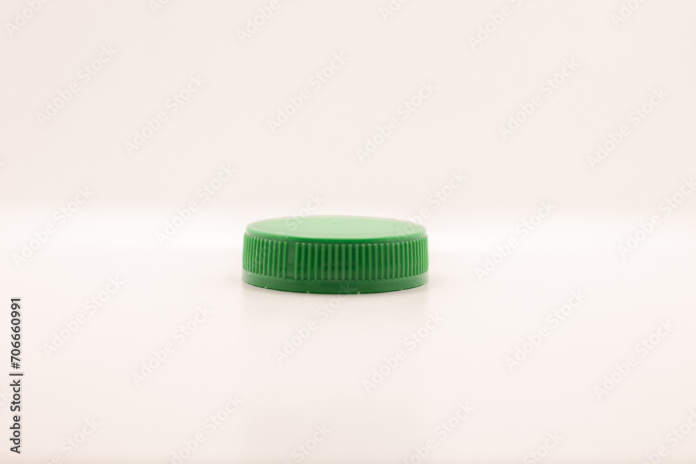 Tapón verde con fondo blanco Tapón verde con fondo blanco