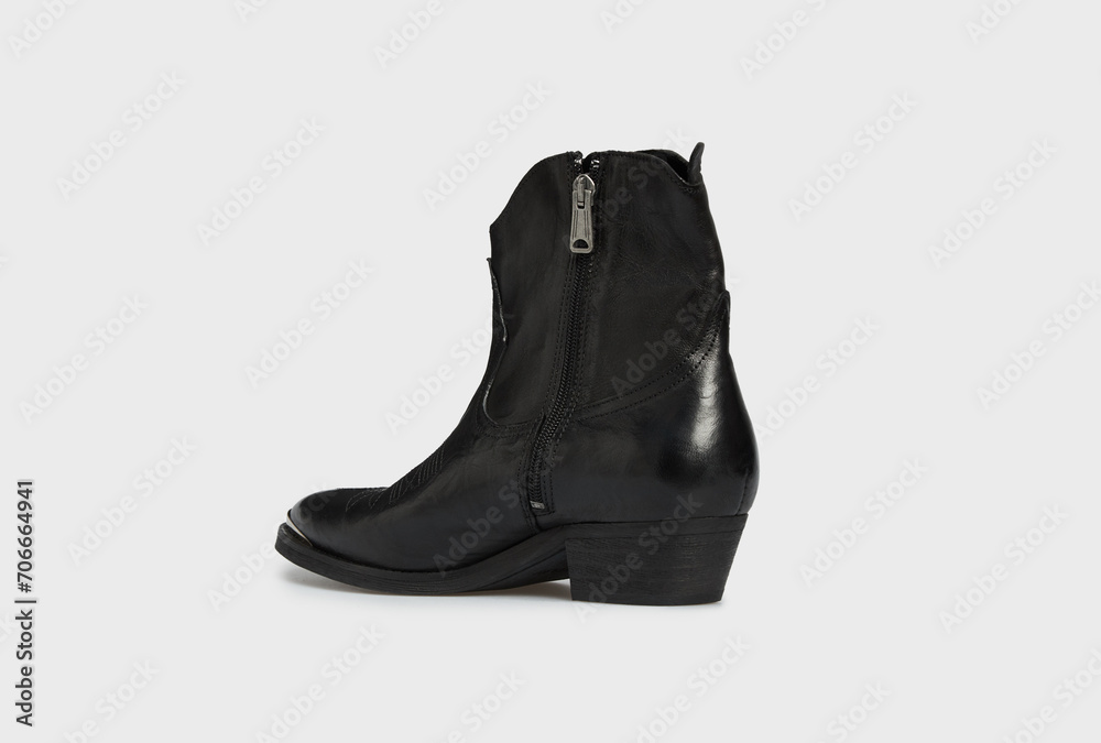 Back view on blank black women's fashion cossack Cowboy boot isolated on white background. Female classic spring autumn shoe with Pointy Toe, heel. Leather casual footwear in futuristic style. Mock up Back view on blank black women's fashion cossack Cowboy boot isolated on white background. Female classic spring autumn shoe with Pointy Toe, heel. Leather casual footwear in futuristic style. Mock up