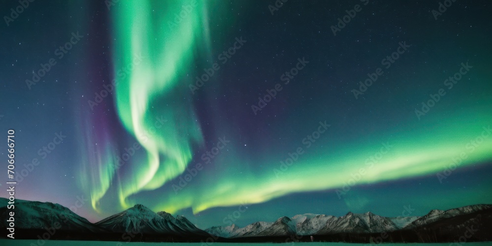  a green and purple aurora bore is in the sky above a mountain range with snow capped mountains in the foreground.