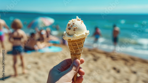 This image features an individual enjoying a vanilla gelato on a sunny beach, with family and friends in the background, embodying the essence of a wonderful summer day.