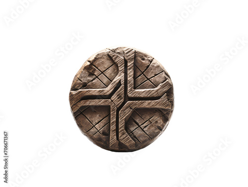 a circular object with a cross carved into it