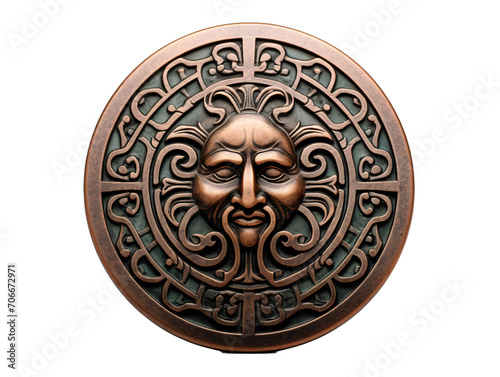 a bronze medallion with a face on it