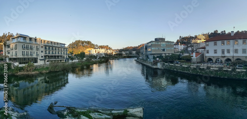 Panoramic view of the thermal area of S. Pedro do Sul  Vouga River and buildings on the banks of the river supporting thermal spas  hotels and others  Viseu  Portugal